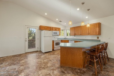 This warm and welcoming home is located in a  highly sought on Prescott Golf and Country Club in Arizona - for sale on GolfHomes.com, golf home, golf lot