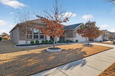 Experience refined living with breathtaking water and sunset on Frisco Lakes Golf Course in Texas - for sale on GolfHomes.com, golf home, golf lot