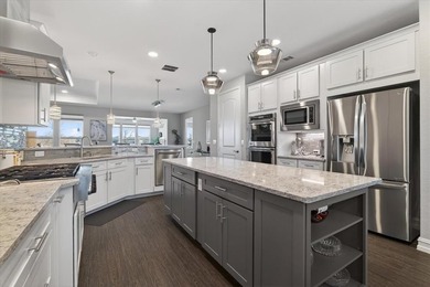 Experience refined living with breathtaking water and sunset on Frisco Lakes Golf Course in Texas - for sale on GolfHomes.com, golf home, golf lot