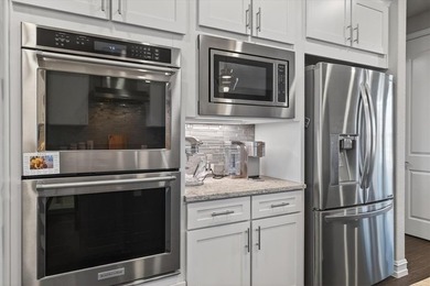 Experience refined living with breathtaking water and sunset on Frisco Lakes Golf Course in Texas - for sale on GolfHomes.com, golf home, golf lot