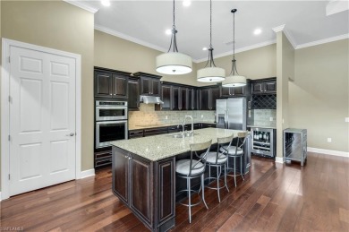 Prepare to be captivated by this jaw-dropping 4-bedroom plus den on  in Florida - for sale on GolfHomes.com, golf home, golf lot