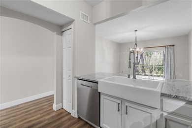 Step into your stunningly updated 2-bedroom, 2.5-bath retreat on Heritage Isles Golf and Country Club in Florida - for sale on GolfHomes.com, golf home, golf lot