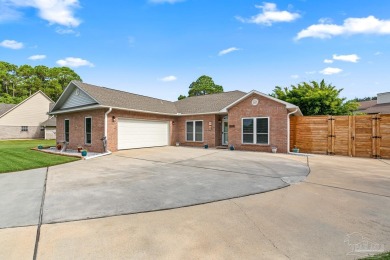 Welcome to this beautifully updated 3-bedroom, 2-bathroom home on Perdido Bay Golf Club in Florida - for sale on GolfHomes.com, golf home, golf lot