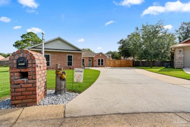 Welcome to this beautifully updated 3-bedroom, 2-bathroom home on Perdido Bay Golf Club in Florida - for sale on GolfHomes.com, golf home, golf lot