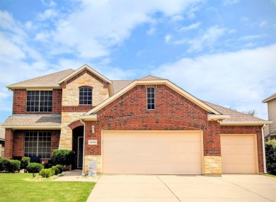 Welcome to this beautifully maintained 4-bedroom, 3.5-bathroom on Frisco Lakes Golf Course in Texas - for sale on GolfHomes.com, golf home, golf lot