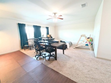Welcome to this beautifully maintained 4-bedroom, 3.5-bathroom on Frisco Lakes Golf Course in Texas - for sale on GolfHomes.com, golf home, golf lot