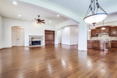 Nestled on a premier GOLF COURSE lot overlooking the tee box of on Lantana Golf Club in Texas - for sale on GolfHomes.com, golf home, golf lot