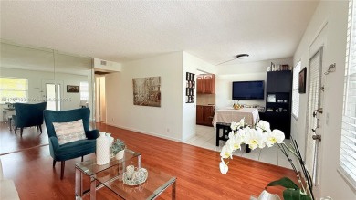 Beautiful and spacious 2BD/1.5BA condo in the highly desirable on Flamingo Lakes Country Club in Florida - for sale on GolfHomes.com, golf home, golf lot