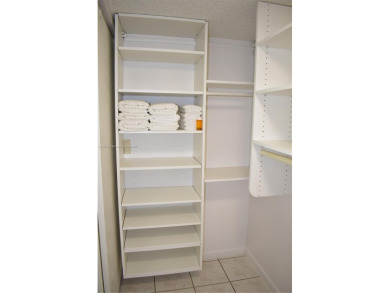 Spacious 2/2 on ground floor with views to the well maintained on Woodmont Country Club in Florida - for sale on GolfHomes.com, golf home, golf lot