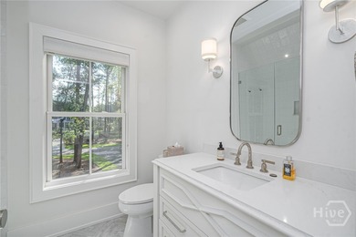 Nestled on 2.13 acres beneath a canopy of mature trees, this 1 on The Ford Field and River Club  in Georgia - for sale on GolfHomes.com, golf home, golf lot