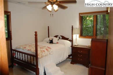 Escape to your own peaceful retreat with 2 bed / 3 bath on Land Harbor Golf Course in North Carolina - for sale on GolfHomes.com, golf home, golf lot