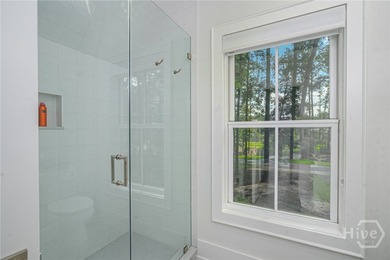 Nestled on 2.13 acres beneath a canopy of mature trees, this 1 on The Ford Field and River Club  in Georgia - for sale on GolfHomes.com, golf home, golf lot