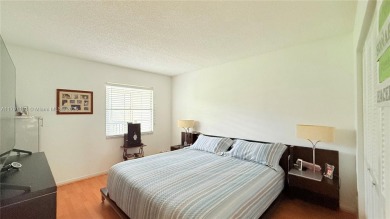 Beautiful and spacious 2BD/1.5BA condo in the highly desirable on Flamingo Lakes Country Club in Florida - for sale on GolfHomes.com, golf home, golf lot