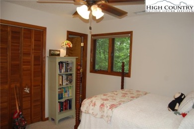 Escape to your own peaceful retreat with 2 bed / 3 bath on Land Harbor Golf Course in North Carolina - for sale on GolfHomes.com, golf home, golf lot