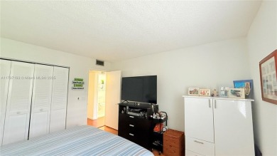 Beautiful and spacious 2BD/1.5BA condo in the highly desirable on Flamingo Lakes Country Club in Florida - for sale on GolfHomes.com, golf home, golf lot