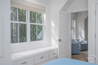 Nestled on 2.13 acres beneath a canopy of mature trees, this 1 on The Ford Field and River Club  in Georgia - for sale on GolfHomes.com, golf home, golf lot