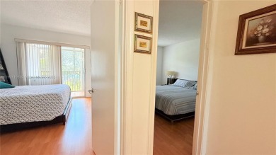 Beautiful and spacious 2BD/1.5BA condo in the highly desirable on Flamingo Lakes Country Club in Florida - for sale on GolfHomes.com, golf home, golf lot