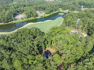 Nestled on 2.13 acres beneath a canopy of mature trees, this 1 on The Ford Field and River Club  in Georgia - for sale on GolfHomes.com, golf home, golf lot