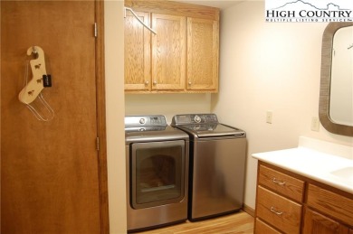 Escape to your own peaceful retreat with 2 bed / 3 bath on Land Harbor Golf Course in North Carolina - for sale on GolfHomes.com, golf home, golf lot