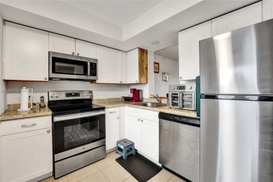 Well-maintained, spacious and bright 2-bedroom, 2-bath condo + on Oriole Golf and Tennis Club in Florida - for sale on GolfHomes.com, golf home, golf lot