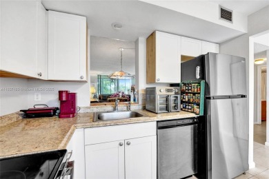 Well-maintained, spacious and bright 2-bedroom, 2-bath condo + on Oriole Golf and Tennis Club in Florida - for sale on GolfHomes.com, golf home, golf lot