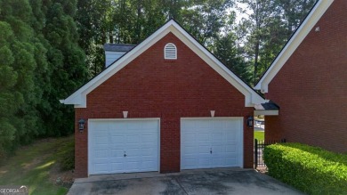 Welcome to this stunning all-brick ranch nestled in a desirable on Monroe Golf and Country Club in Georgia - for sale on GolfHomes.com, golf home, golf lot