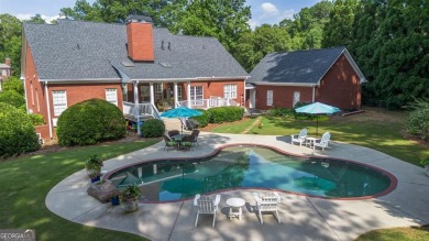 Welcome to this stunning all-brick ranch nestled in a desirable on Monroe Golf and Country Club in Georgia - for sale on GolfHomes.com, golf home, golf lot