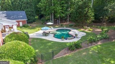 Welcome to this stunning all-brick ranch nestled in a desirable on Monroe Golf and Country Club in Georgia - for sale on GolfHomes.com, golf home, golf lot