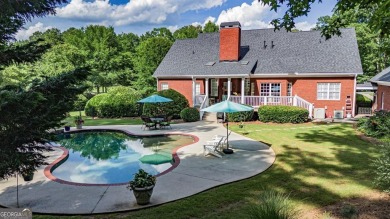 Welcome to this stunning all-brick ranch nestled in a desirable on Monroe Golf and Country Club in Georgia - for sale on GolfHomes.com, golf home, golf lot