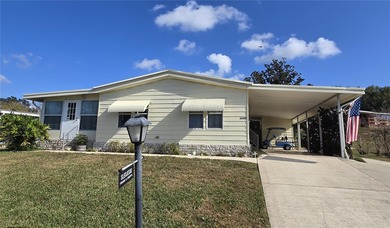 This 2-bedroom 2 bath home in Banbury Village of Zellwood on Zellwood Station Country Club in Florida - for sale on GolfHomes.com, golf home, golf lot