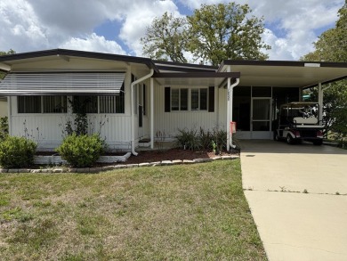 Located in the 55+ community of Rolling Greens Village in Ocala on Rolling Greens Executive Golf Community in Florida - for sale on GolfHomes.com, golf home, golf lot