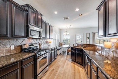 This home has it all, 4 bedrooms, 2.5 bathrooms, 2 LA's, 2 car on WestRidge Golf Course in Texas - for sale on GolfHomes.com, golf home, golf lot