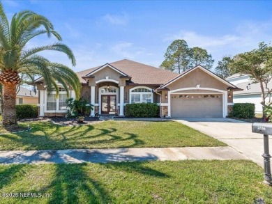 This exquisite 5-bedroom, 5-bathroom home in Fleming Island on Golf Club At Fleming Island in Florida - for sale on GolfHomes.com, golf home, golf lot