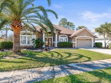 This exquisite 5-bedroom, 5-bathroom home in Fleming Island on Golf Club At Fleming Island in Florida - for sale on GolfHomes.com, golf home, golf lot