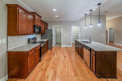 This elegant 3-bedroom, 2.5-bath, single-level home offers the on Monticello Golf Club At Savannah Lakes in South Carolina - for sale on GolfHomes.com, golf home, golf lot