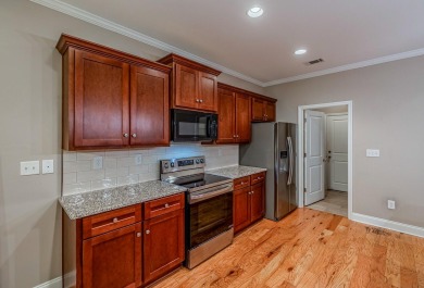 This elegant 3-bedroom, 2.5-bath, single-level home offers the on Monticello Golf Club At Savannah Lakes in South Carolina - for sale on GolfHomes.com, golf home, golf lot