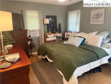 Welcome to 61 River Loop - a quaint mountain retreat located in on Land Harbor Golf Course in North Carolina - for sale on GolfHomes.com, golf home, golf lot
