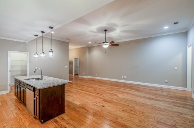 This elegant 3-bedroom, 2.5-bath, single-level home offers the on Monticello Golf Club At Savannah Lakes in South Carolina - for sale on GolfHomes.com, golf home, golf lot