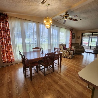 Come take a look at this home located in the GATED neighborhood on Silver Lake Executive Golf Course in Florida - for sale on GolfHomes.com, golf home, golf lot