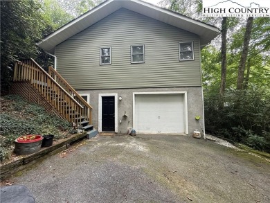 Welcome to 61 River Loop - a quaint mountain retreat located in on Land Harbor Golf Course in North Carolina - for sale on GolfHomes.com, golf home, golf lot