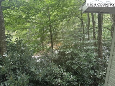 Welcome to 61 River Loop - a quaint mountain retreat located in on Land Harbor Golf Course in North Carolina - for sale on GolfHomes.com, golf home, golf lot
