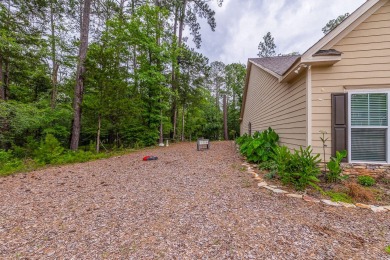 This elegant 3-bedroom, 2.5-bath, single-level home offers the on Monticello Golf Club At Savannah Lakes in South Carolina - for sale on GolfHomes.com, golf home, golf lot