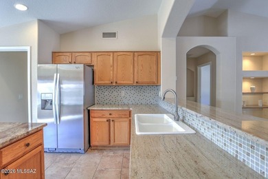 This well maintained home features an inviting atmosphere on Saddlebrooke Golf Course in Arizona - for sale on GolfHomes.com, golf home, golf lot
