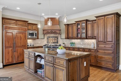 Experience the Pinnacle of Luxury Living at The Manor Golf and on Manor Golf and Country Club in Georgia - for sale on GolfHomes.com, golf home, golf lot