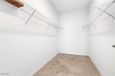 Step into resort-style living in this nearly new 4 Bedroom, 2 on River Hall Country Club in Florida - for sale on GolfHomes.com, golf home, golf lot