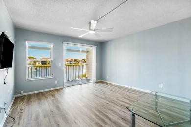 Enjoy breathtaking panoramic lake views from this charming on PGA National Golf Club in Florida - for sale on GolfHomes.com, golf home, golf lot