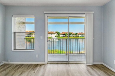 Enjoy breathtaking panoramic lake views from this charming on PGA National Golf Club in Florida - for sale on GolfHomes.com, golf home, golf lot