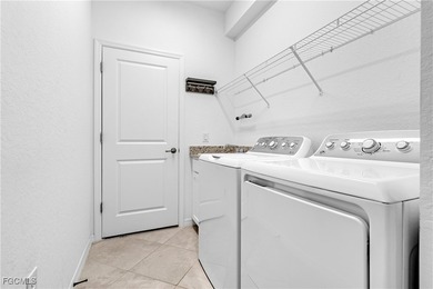 Step into resort-style living in this nearly new 4 Bedroom, 2 on River Hall Country Club in Florida - for sale on GolfHomes.com, golf home, golf lot