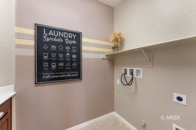 Welcome to your desert oasis in the highly sought-after Sun City on Conestoga Golf Club in Nevada - for sale on GolfHomes.com, golf home, golf lot