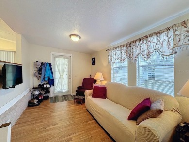 SNOWBIRDS OR HOMEOWNERS WELCOME- YOU OWN the land. 2 Bedroom on Glen Lakes Country Club in Florida - for sale on GolfHomes.com, golf home, golf lot